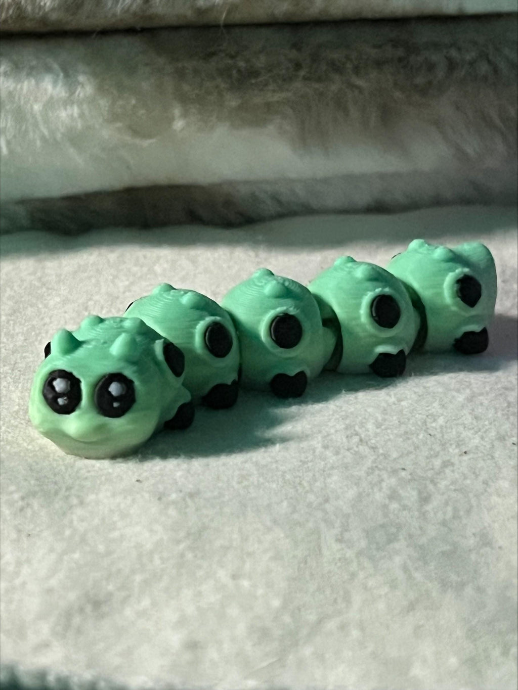 Caterpillar with a house