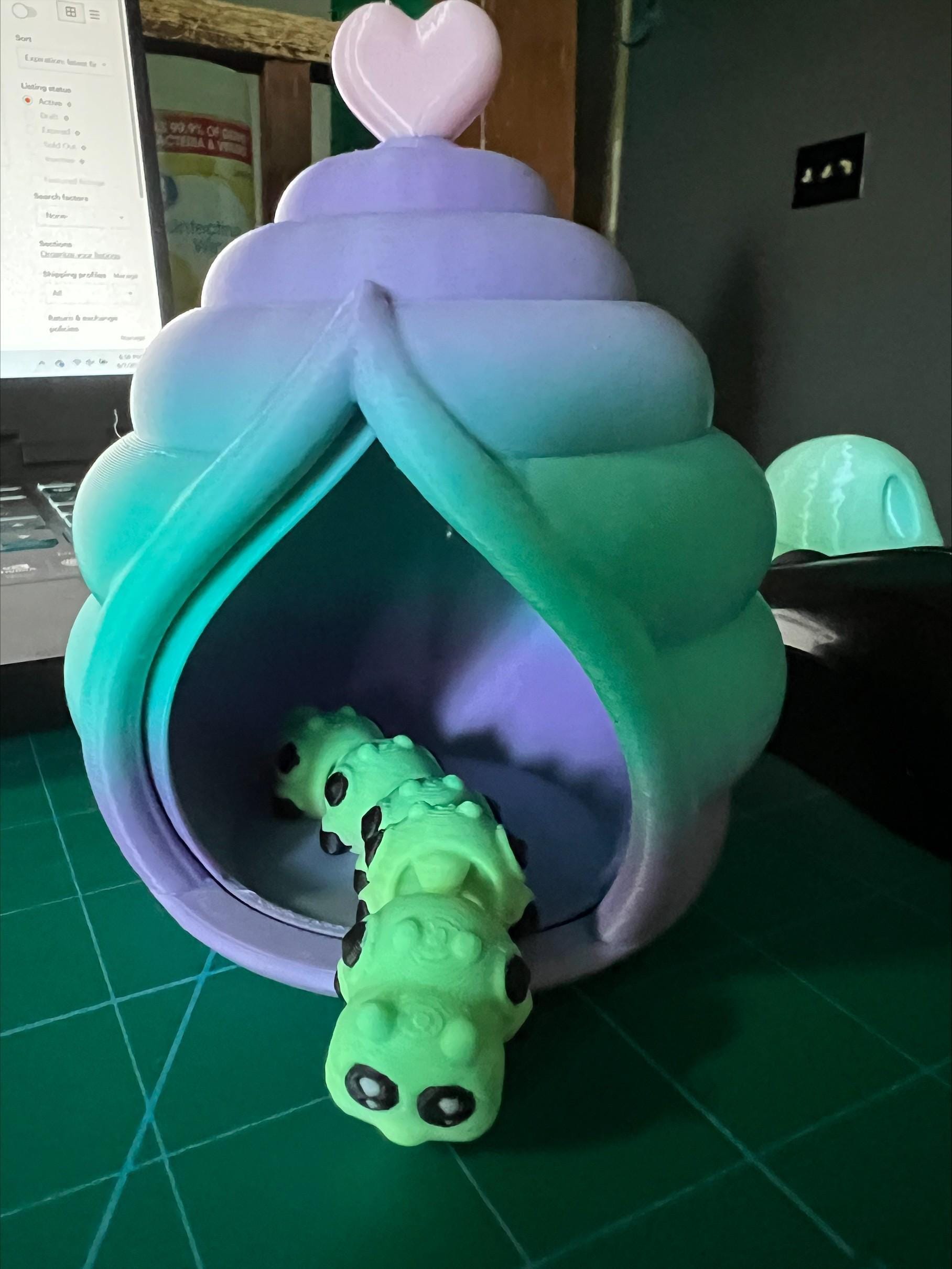 Caterpillar with a house